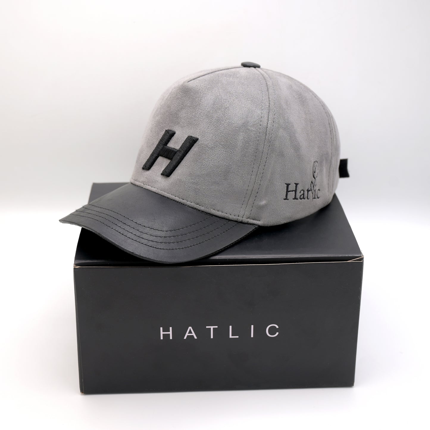 Grey suede H logo cap