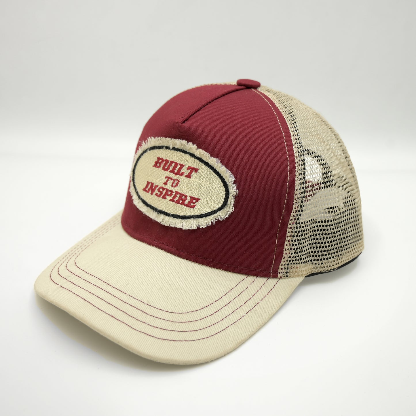 Distressed build to inspire trucker cap