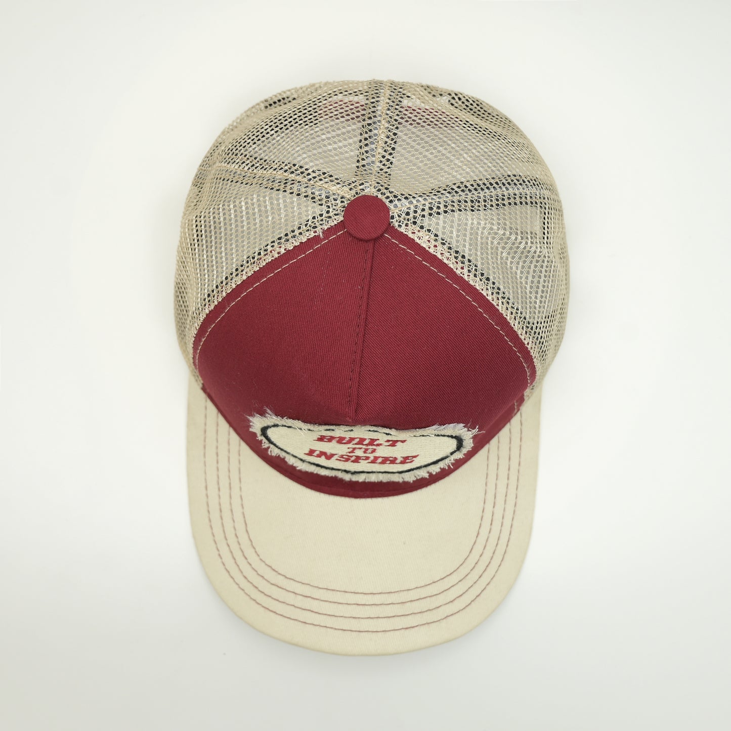 Distressed build to inspire trucker cap
